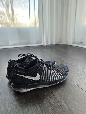 Nike Women's Black And Blue Flyknit Running Shoes